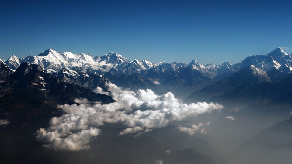 The Himalayas seen through clouds 