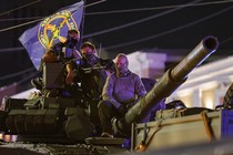 Photograph of Wagner mercenaries on a tank