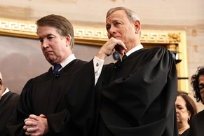 Photograph of several Supreme Court justices, with Kavanaugh and Roberts in the foreground.