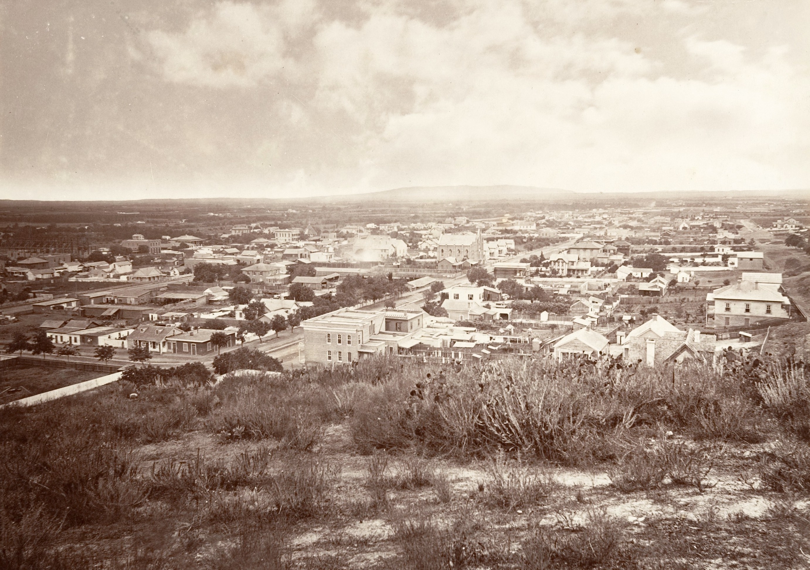 A view of the relatively small city of Los Angeles, seen from a nearby hilltop, in 1876.
