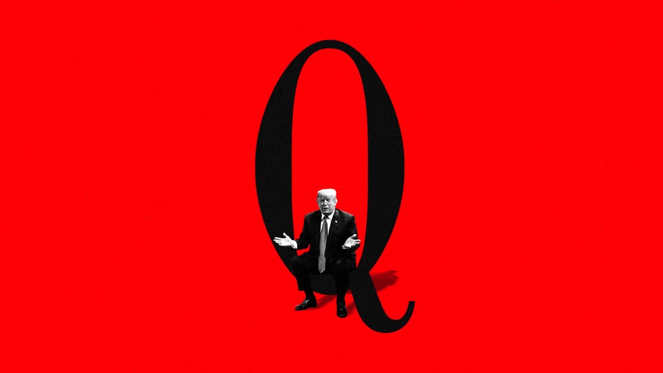 Donald Trump sitting in the letter Q