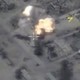 Russian bombs hit ISIS targets near the Syrian city of Palmyra in late May.