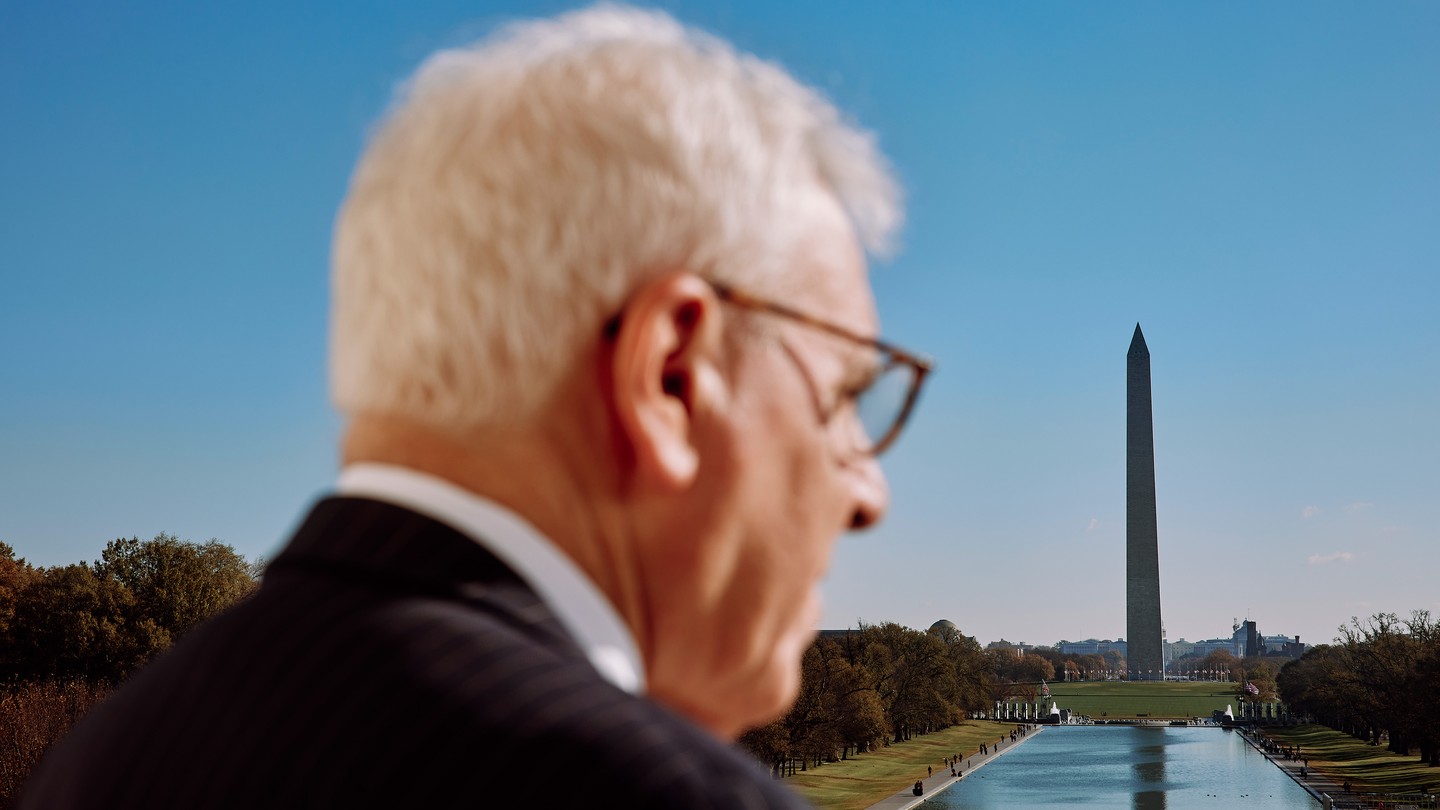 David Rubenstein's profile, with the Washington Monument in the background