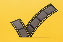 An image of a filmstrip shaped like a check mark
