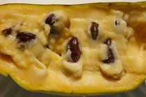 Photo of a cut-open pawpaw