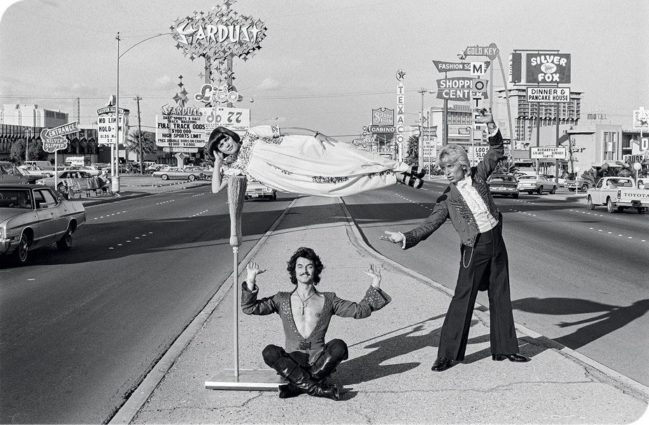 A photo of Sigfried and Roy performing a levitating trick on the Las Vegas strip.
