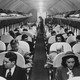 Old photo of people in an airplane