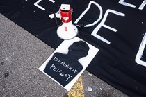 A bullhorn on a protest sign