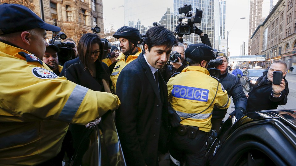 Jian Ghomeshi leaving the courthouse after the first day of his trial in Toronto, on February 1, 2016