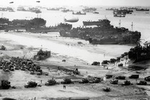 American military vehicles of all styles land at Omaha Beach, Normandy, in 1944