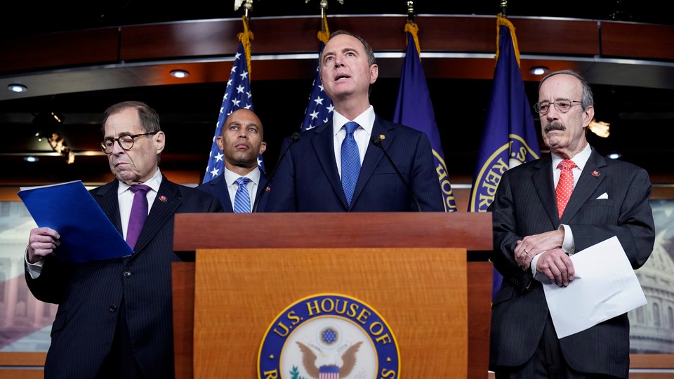 Adam Schiff, Jerrold Nadler, Hakeem Jeffries, and Eliot Engel speak in front of a podium during a media briefing.