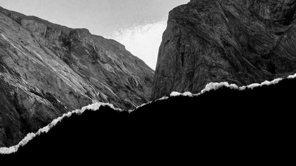 Black-and-white photograph of barren mountains