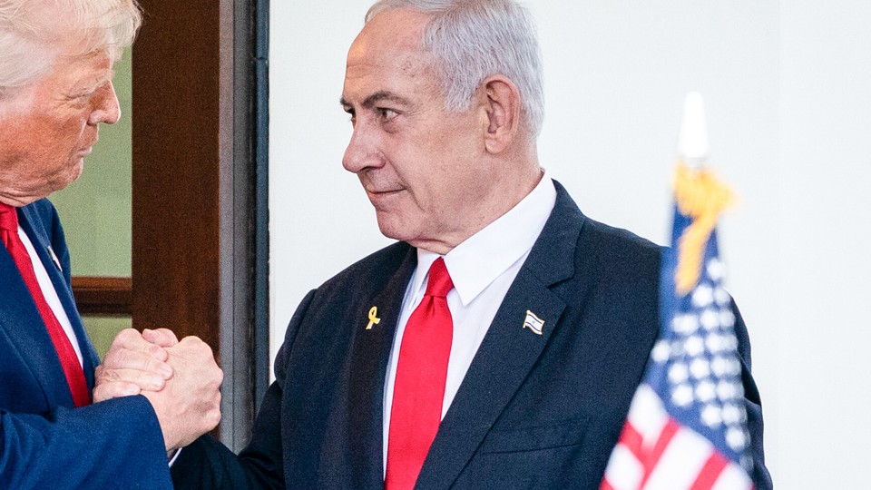 A picture of Netanyahu and Trump shaking hands.