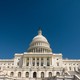 The U.S. Capitol under a vast blue sky