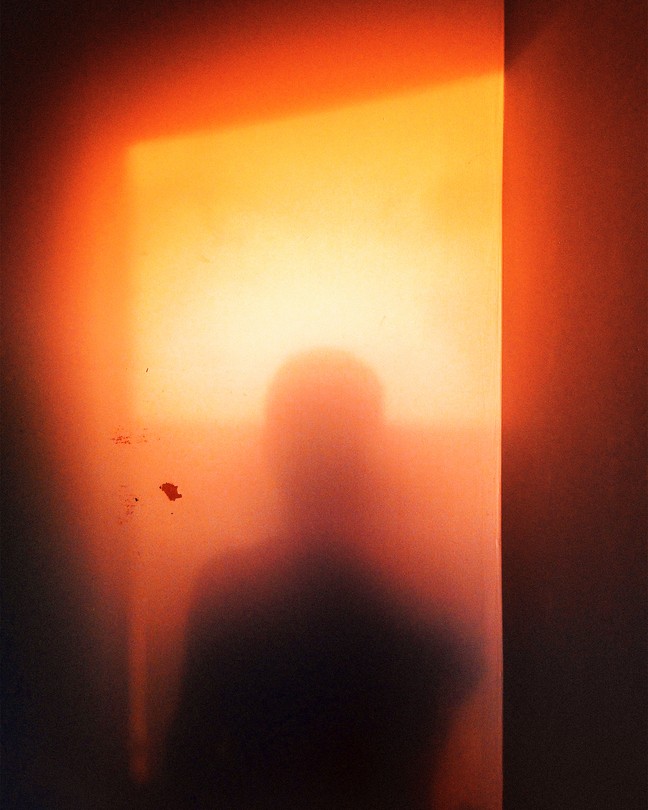 shadow of a figure in a doorway