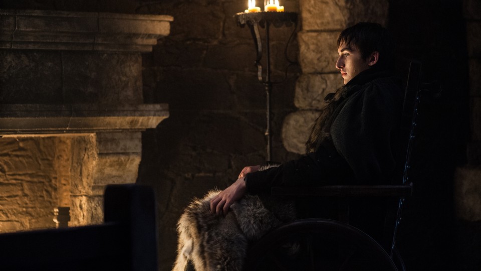 Bran Stark sitting before a fire on 'Game of Thrones'