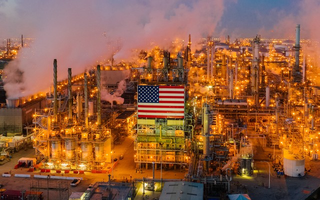 An oil field in McKintrick, California, with an American flag displayed