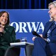 Kamala Harris and Liz Cheney laugh together at a speaking engagement