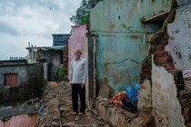 Sahibraj Ramadhar Yadav in front of his house, which collapsed during the monsoon landslide in Panchsheel Chawl, in Vikhroli