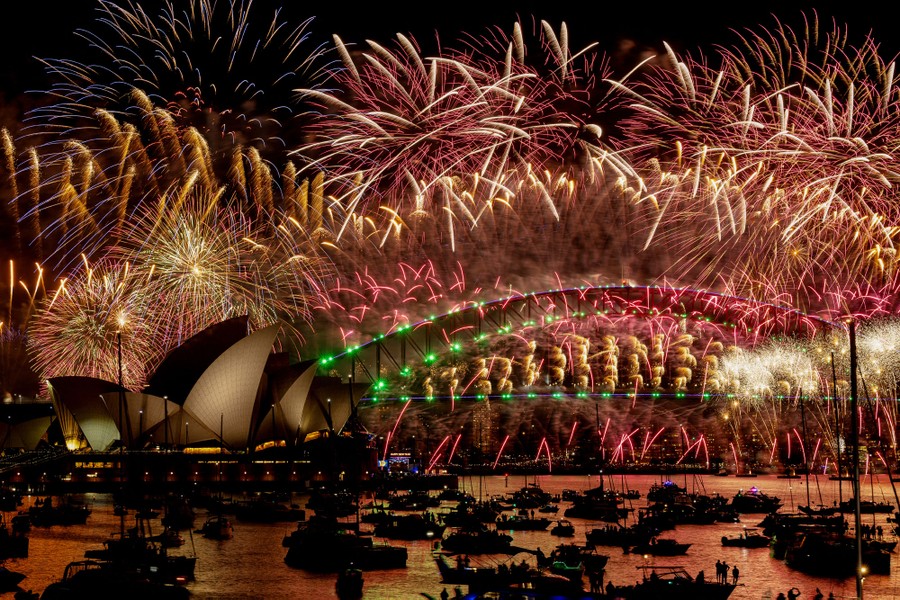 Fireworks explode over the Sydney Harbour Bridge.