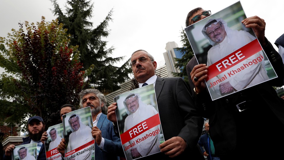 Human-rights activists and friends of the Saudi journalist Jamal Khashoggi protest outside the Saudi consulate in Istanbul, Turkey, on October 8, 2018.