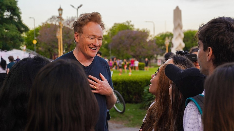 Conan O’Brien talks to a group of people