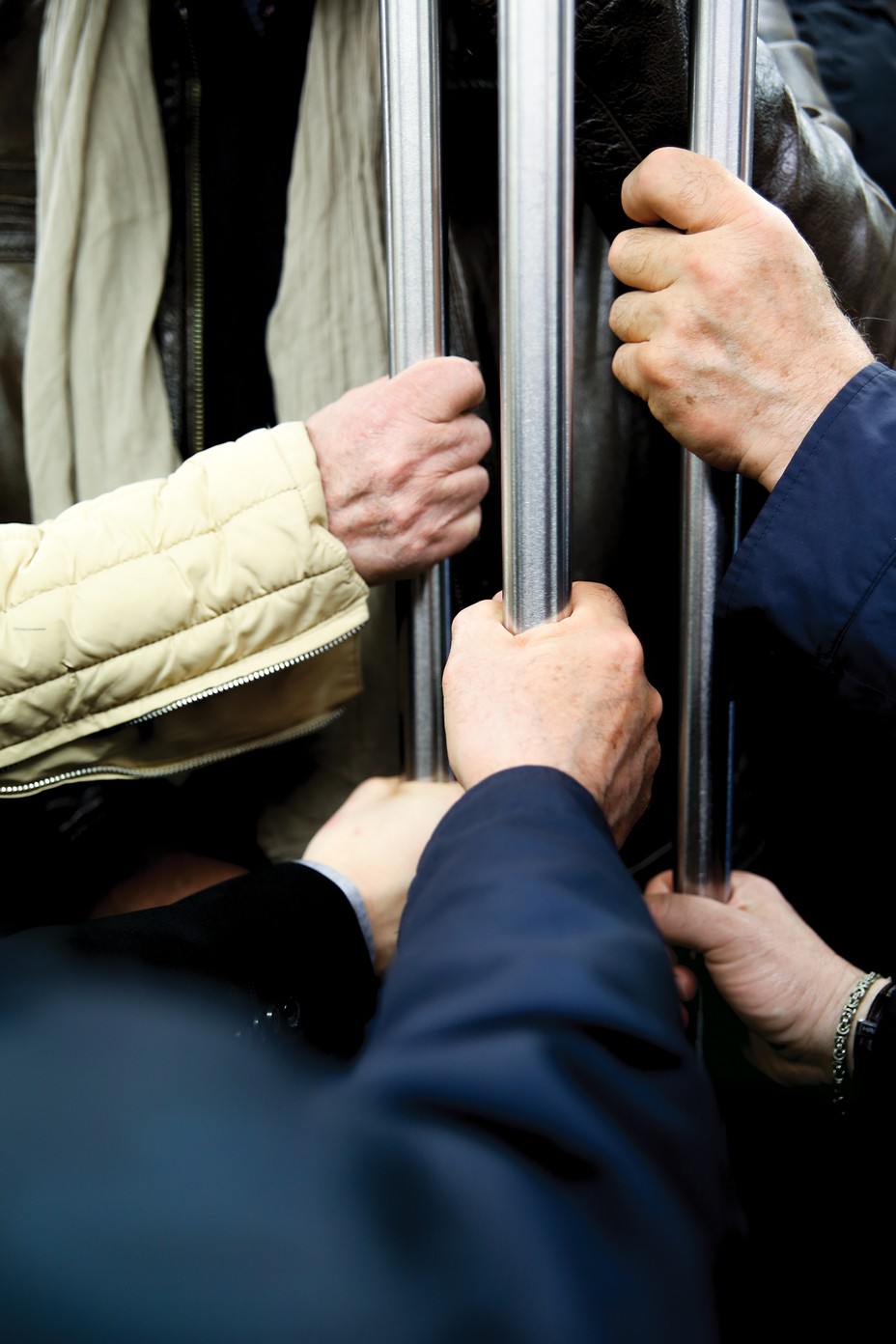Camille Picquot: photo of hands holding on to subway pole