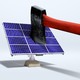 A hatchet buried in a solar panel