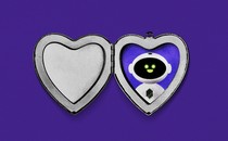 A silver heart-shaped locket is open to reveal the image of a robot inside. The silver locket is set against a deep-purple background.