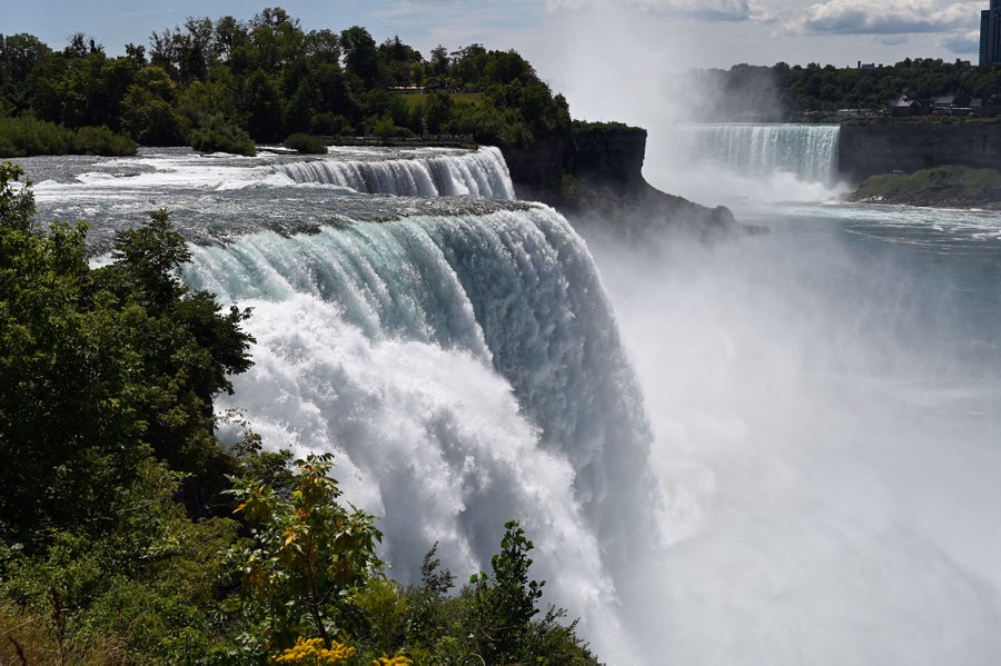 A view of water flowing over Niagara Falls.