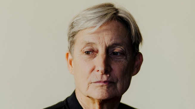 A photo portrait of Judith Butler looking to the side