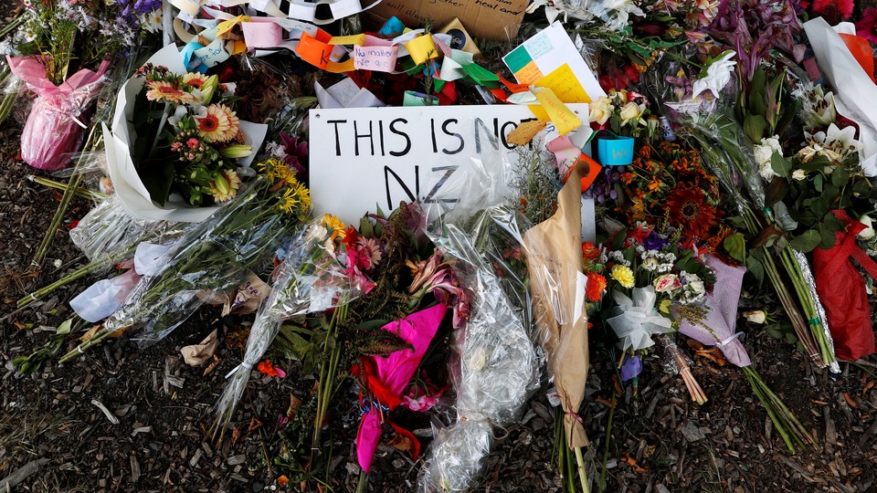 Flower tributes outside the Al-Noor mosque after it was reopened in Christchurch, New Zealand