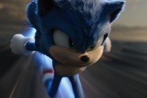 Sonic the Hedgehog zooming across a landscape in "Sonic 2"