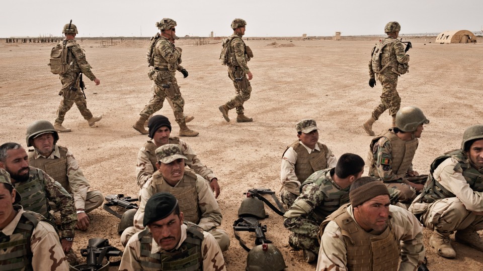 U.S. Army soldiers oversee the training of their Afghan counterparts.