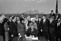 Lyndon B. Johnson signing the Immigration and Nationality Act of 1965