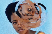 Photo illustration of a woman with digital circles