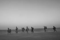 Soldiers walking in a line