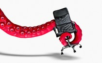 An octopus arm grabbing an office chair