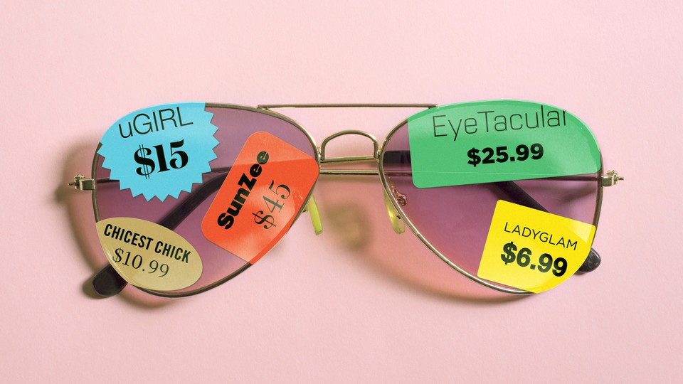 Sunglasses covered in brand tags and price stickers
