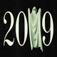 Illustration of the number 2019 in which the "1" is replaced by a ghost