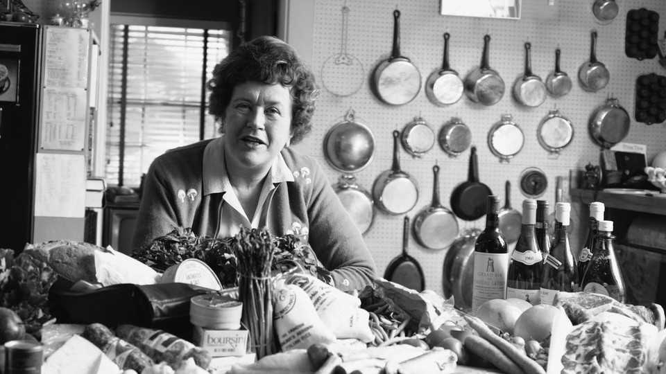 Portrait of the American chef, author, cooking teacher, and TV host Julia Child (1912–2004) as she poses in her kitchen, in Cambridge, Massachusetts, 1972.