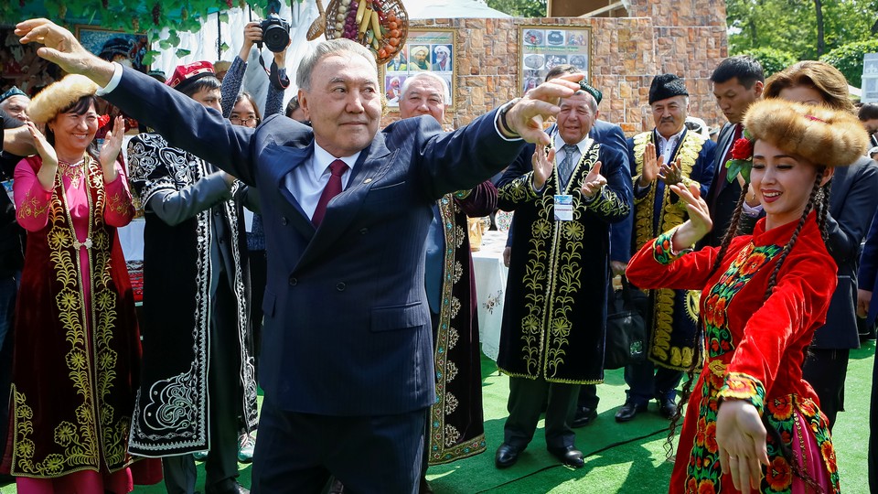 Former Kazakh President Nursultan Nazarbayev dances at a celebration for Kazakhstan People's Unity Day in 2016.