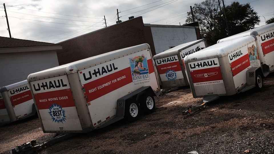 U-Haul moving trailers sit in a parking lot in Biloxi, Mississippi.