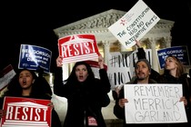 Demonstrators gather outside the Supreme Court building to protest President Donald Trump's appointment of Neil Gorsuch