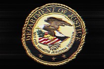 A distorted, crackly version of the Department of Justice seal