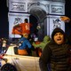 Morocco fans celebrate the team's defeat of Portugal in front of the Arc de Triomphe, in Paris.
