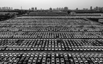 Aerial view of new Nissan vehicles sit parked at a parking lot in Xiangyang, Hubei Province of China