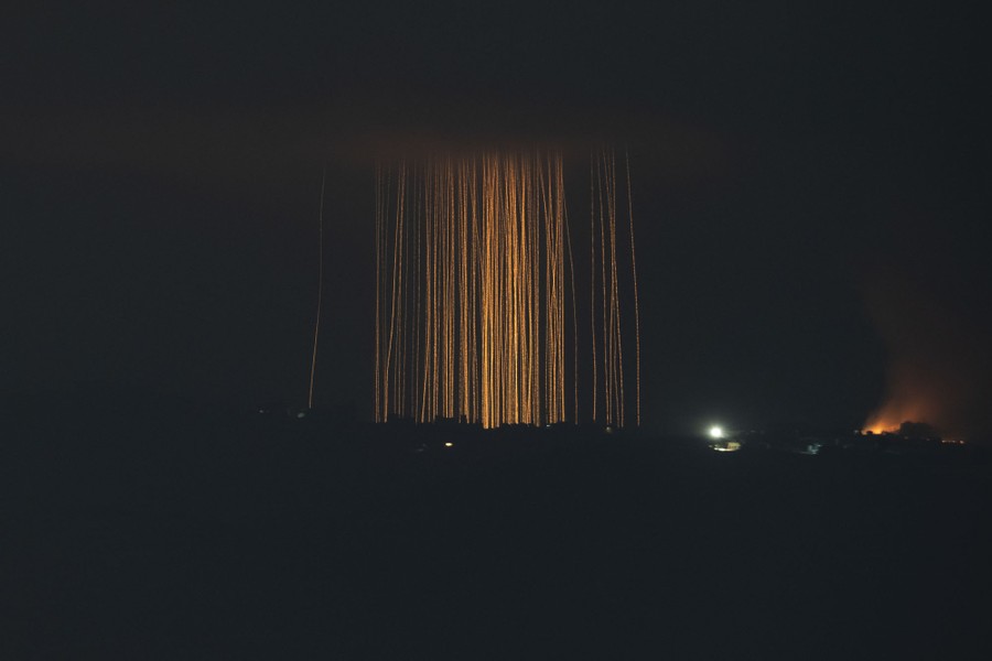Vertical streaks of light, seen at night