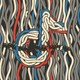 red white and blue wires forming a TikTok logo frayed and broken through the middle