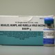 A dose of a measles, mumps, and rubella vaccine